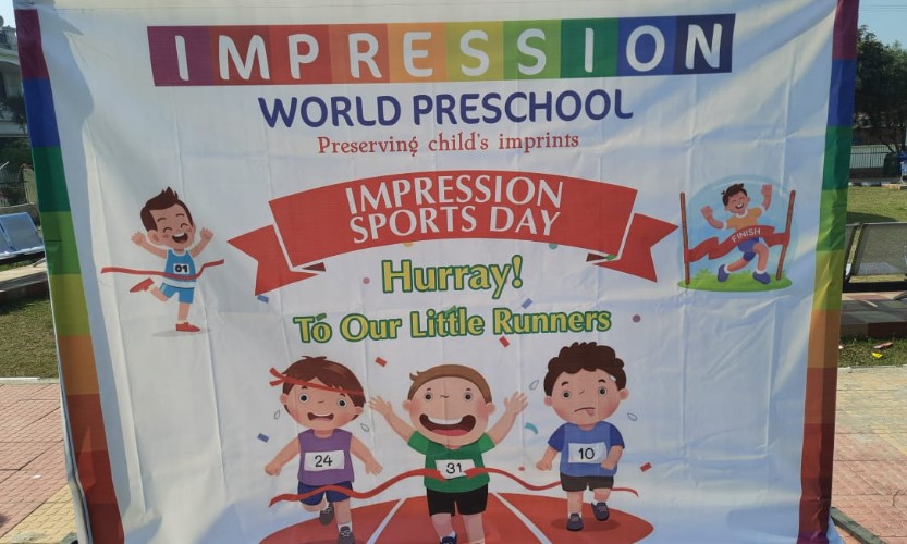 A banner showing sports day of 'Impression World Pre-School.
