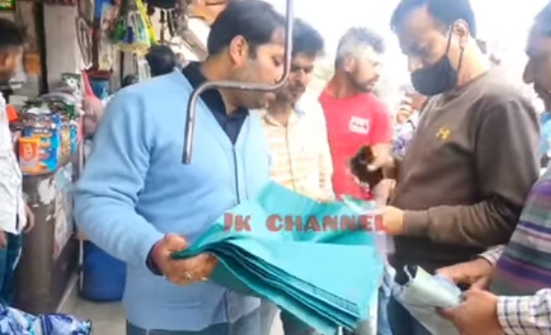 JMC officials inspecting polythene bags in a shop in Jammu