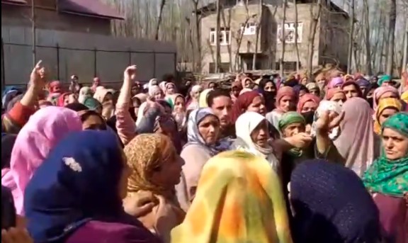 Family of Budgam woman staging protest , who was killed and cut into pieces