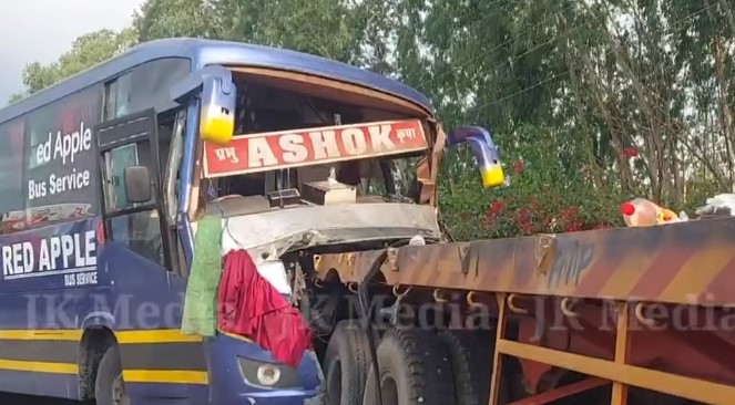 Bus and tractor trailer that collided with each other on Jammu-Pathankot National Highway