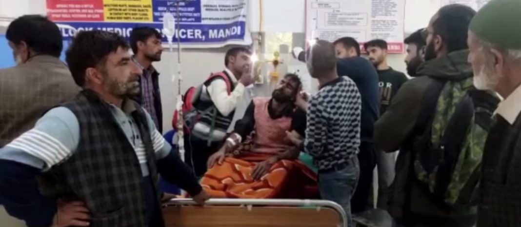 Shabir Ahmed being nursed by doctors at Poonch hospital who is attacked by bear attack.